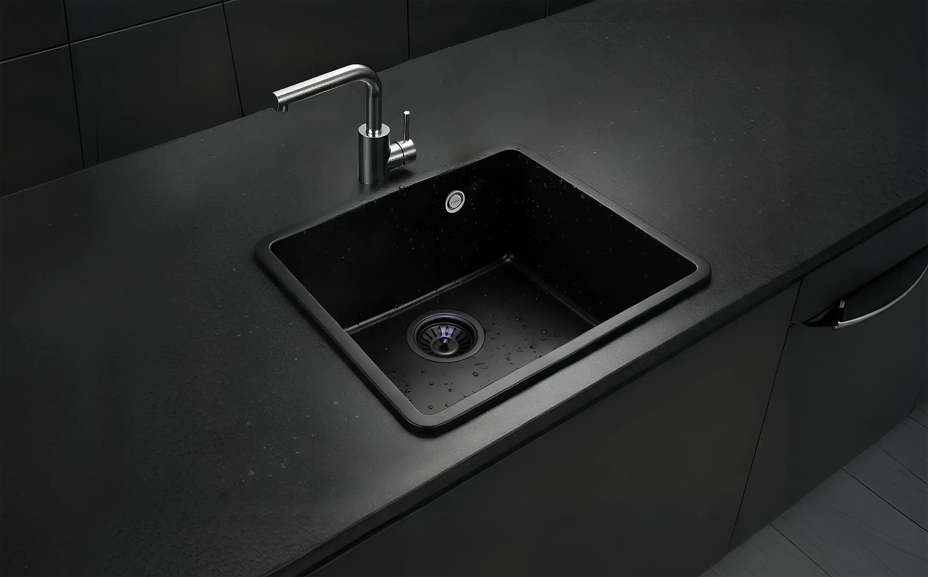 Fregadero modelo Disfrutar40.40QZ en una cocina negra