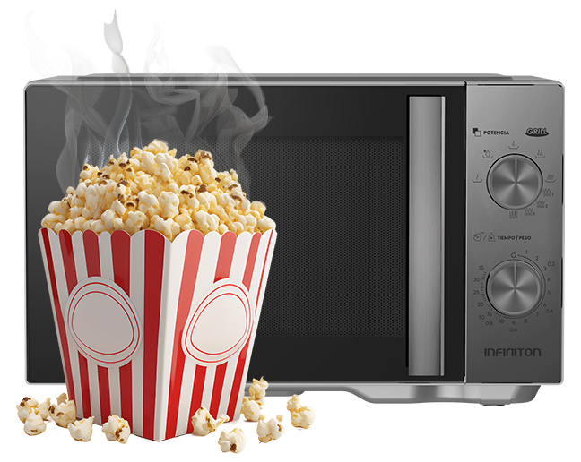 Microondas de fondo, con un paquete de palomitas delante