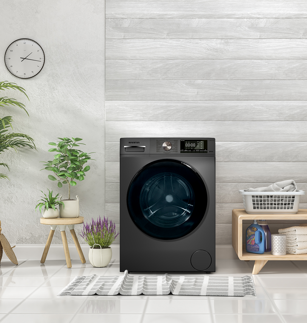 Una lavadora con plantas al lado